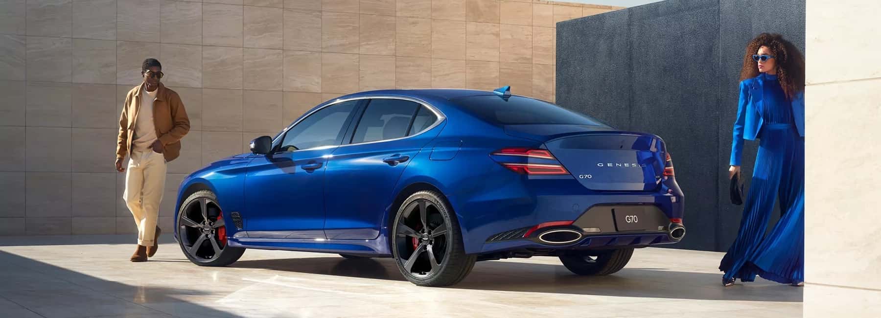 2026 Genesis G70 couple walks around car