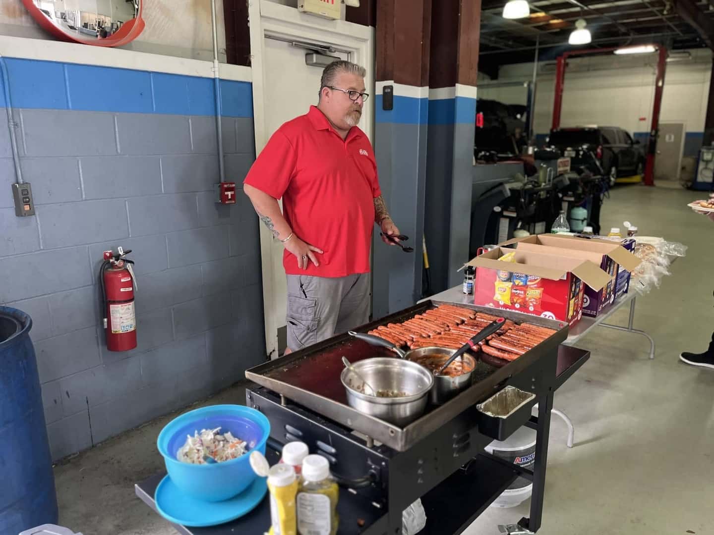 Man grilling hot dogs