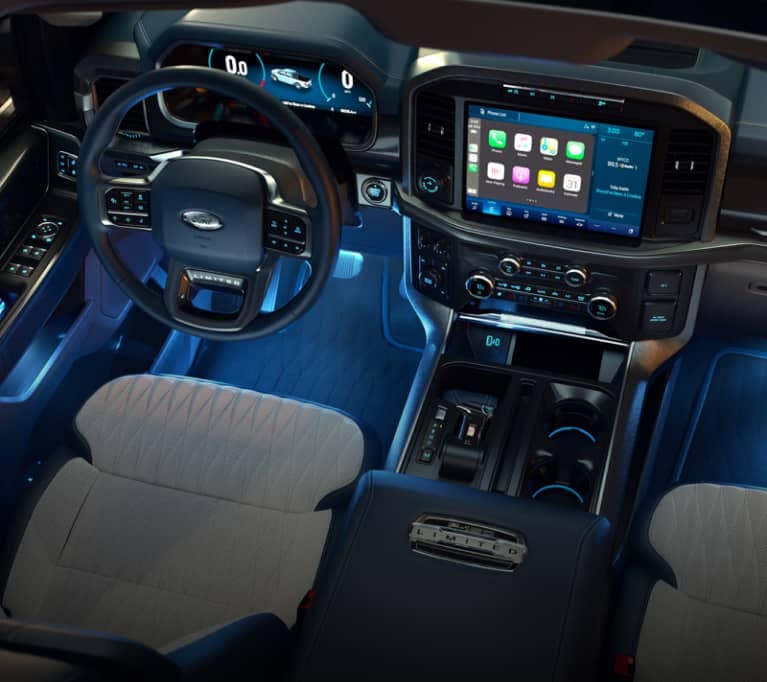 interior of ford vehicle with blue backlight