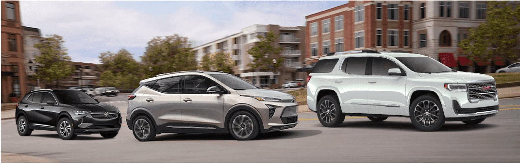 Buick-Chevrolet-GMC-SUVs-in-line-city-street