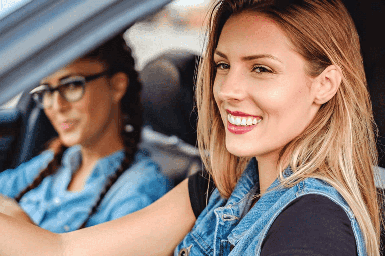 happy-women-driving-new-car