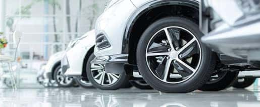 side view of cars and wheels