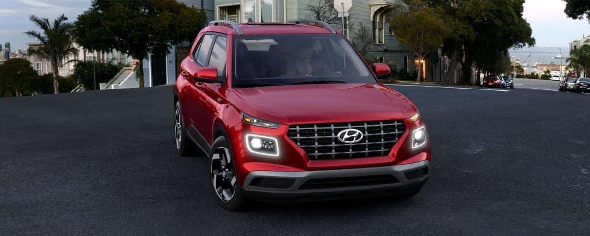 A front view of a red 2020 Hyundai Venue Hybrid