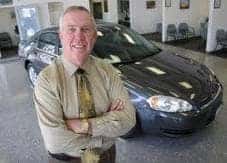 interior image of car salesman in showroom at Gold Rush Chevy