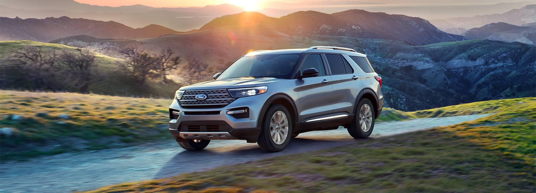 2022 Ford Explorer in front of a mountain sunset