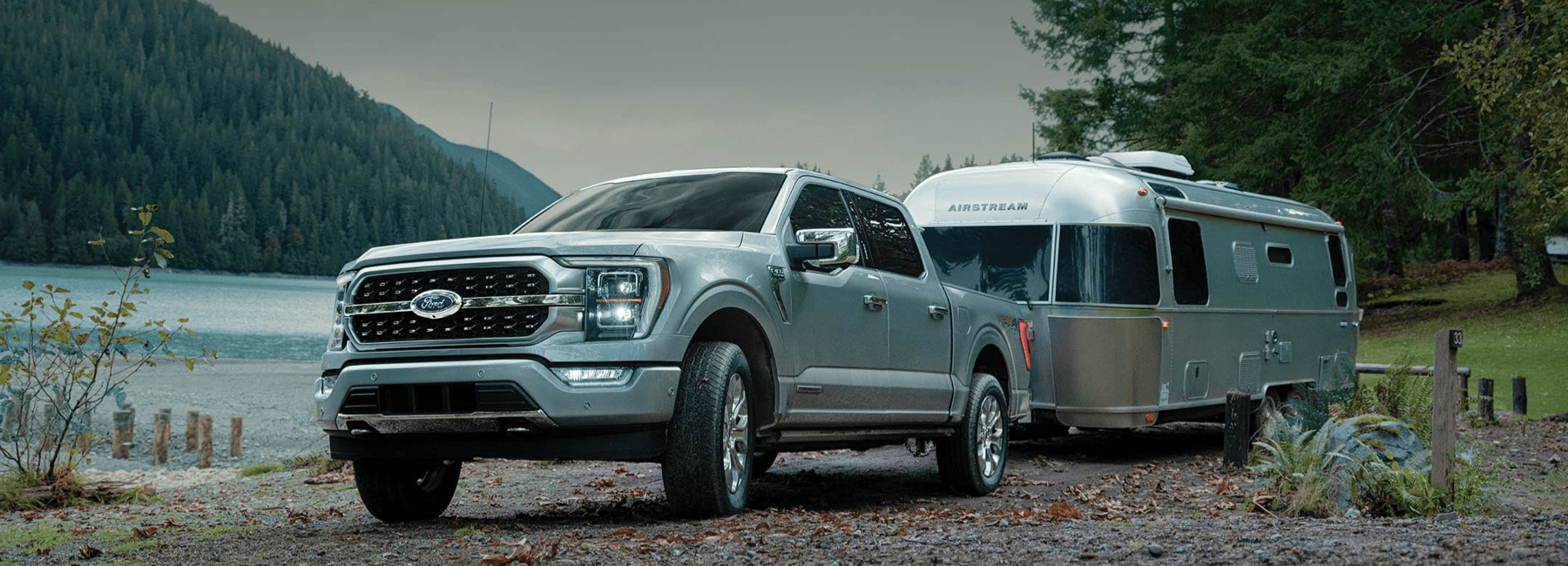 2022-Ford-F-150-with-trailer-by-mountain-lake