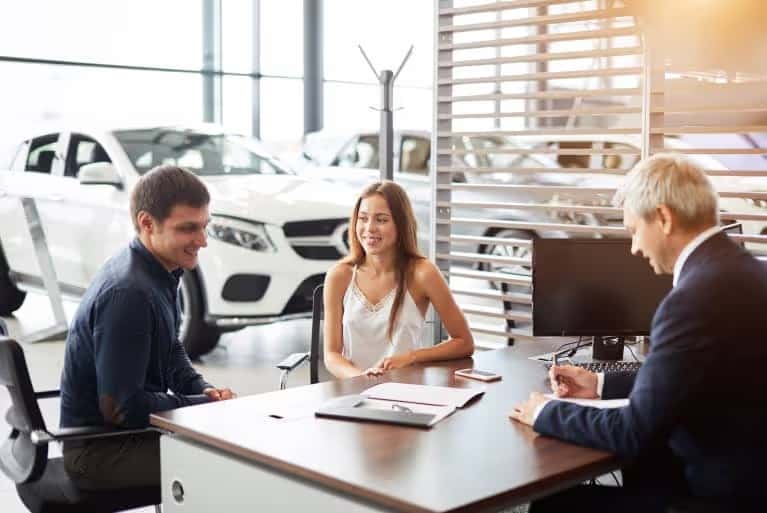couple-working-with-finance-specialist
