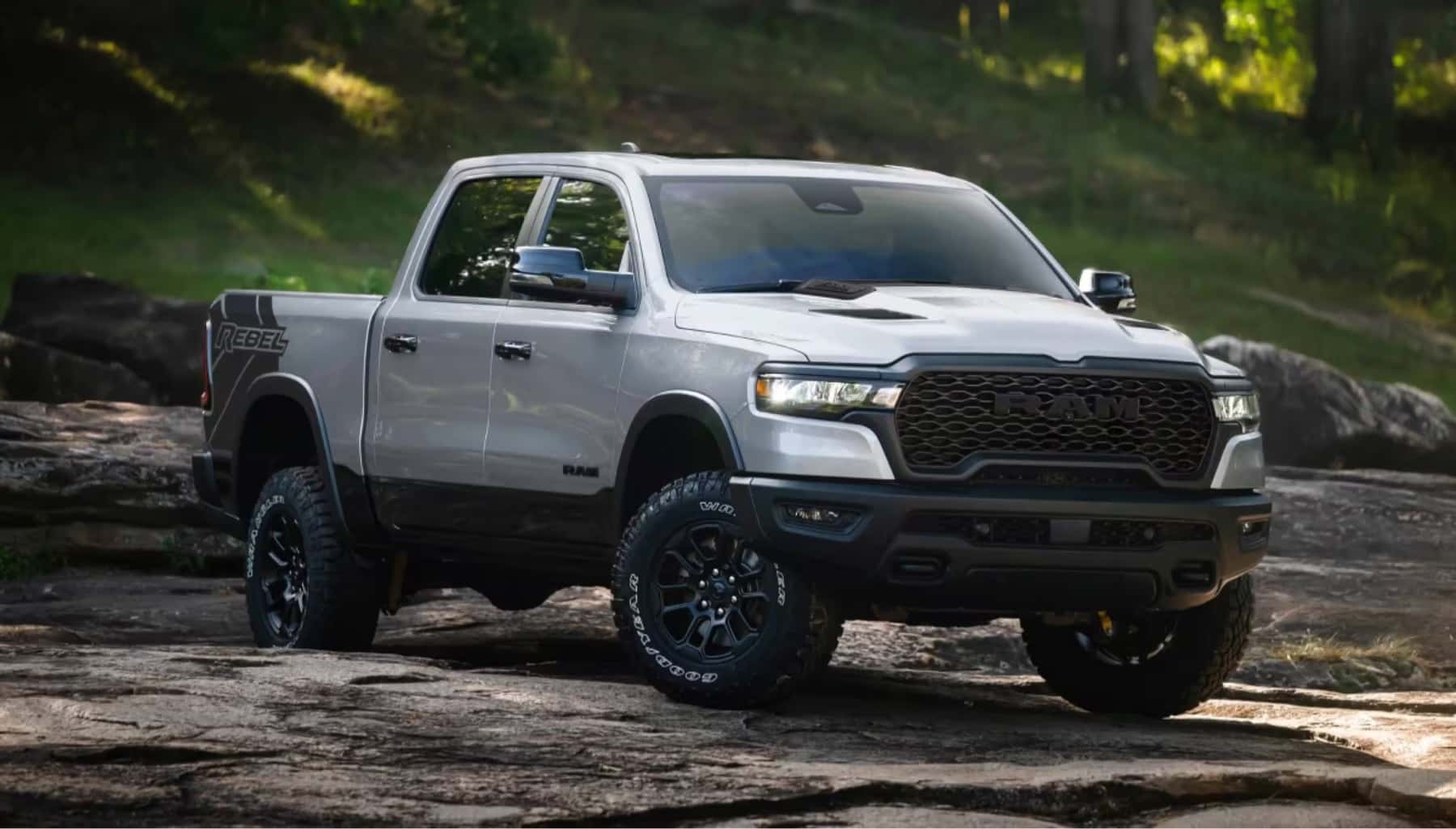 2026-ram-1500-driving-on-a-rocky-creek-bed