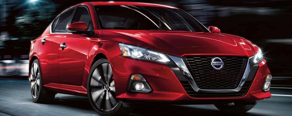 2021 Nissan Altima driving down city street