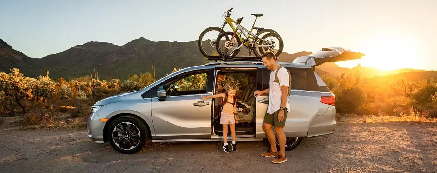 family-exiting-their-van
