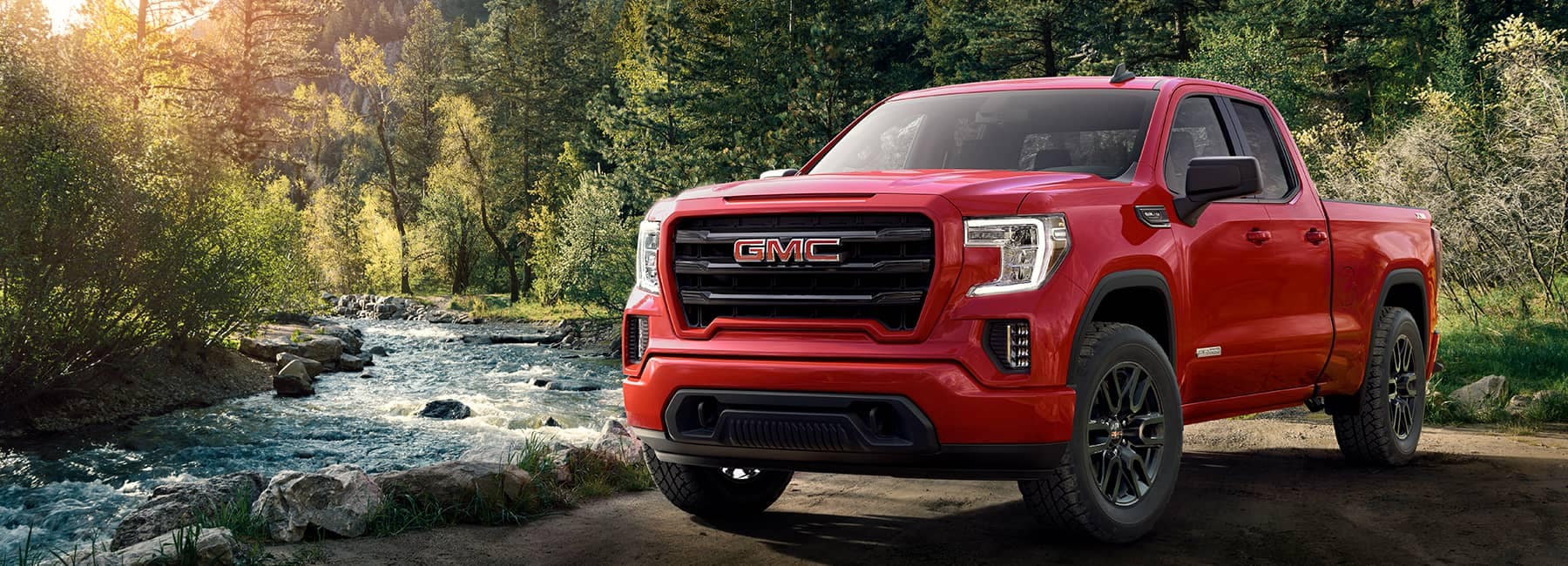 Red 2020 GMC Sierra 1500 by a River
