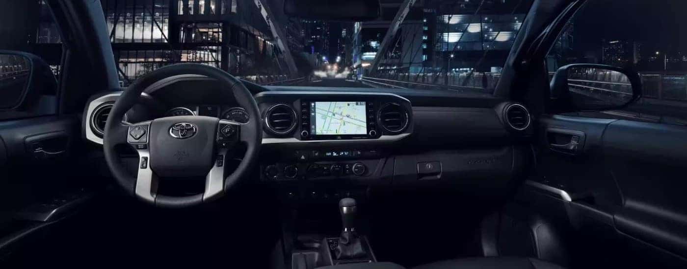 The dash is shown in a 2023 Toyota Tacoma.