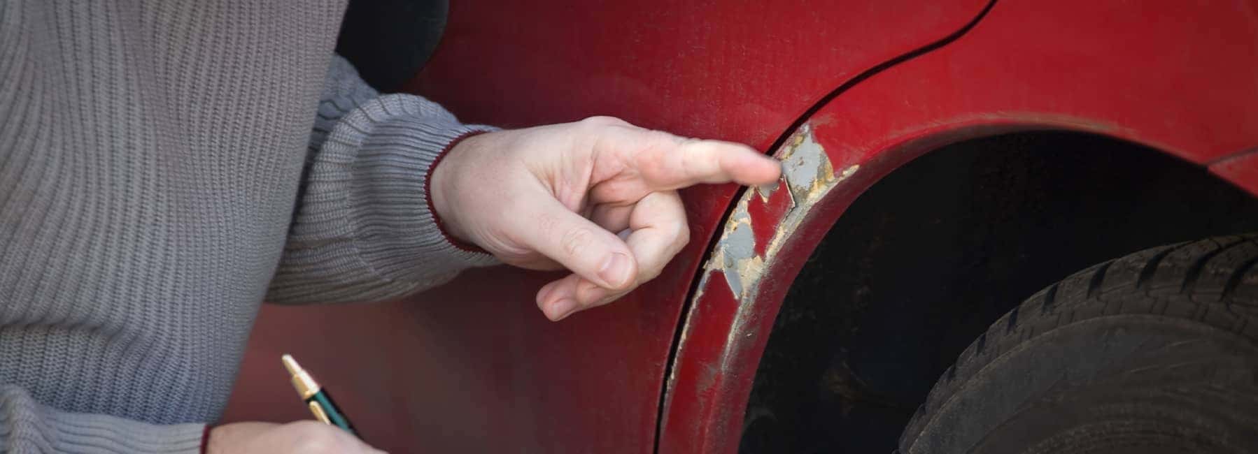 Minor Scratches on the wheel well of a car
