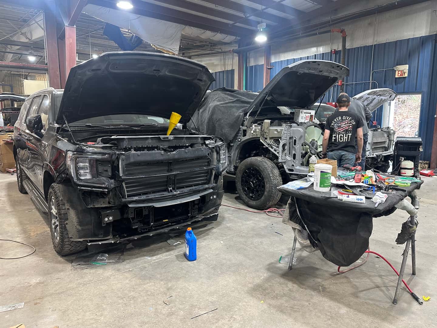 Vehicles In A Shop