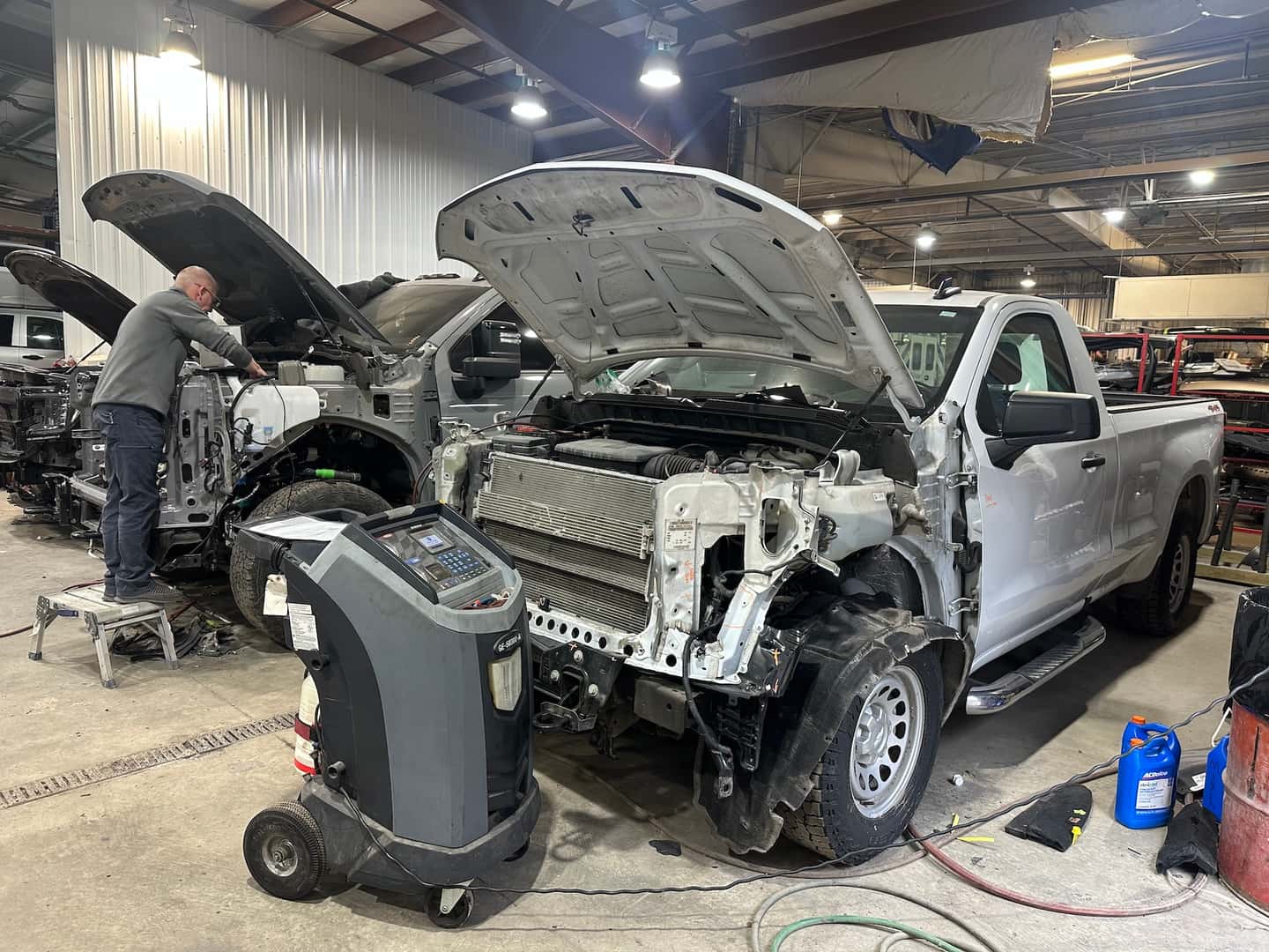 Mechanics and Vehicles in a Shop