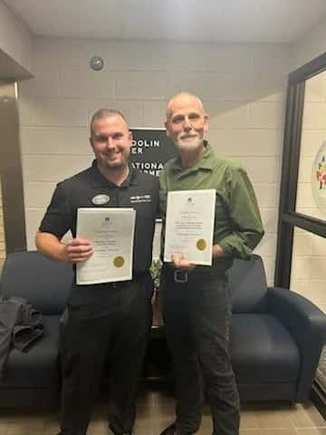 Heartland Chevrolet Community partner certificates held by car dealers