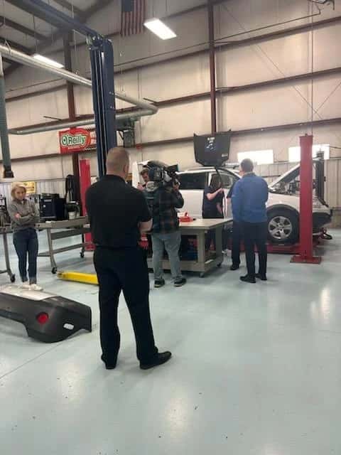 media videotaping in service bay