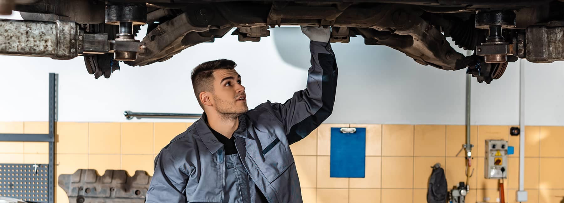 Mechanic reviews a car repair