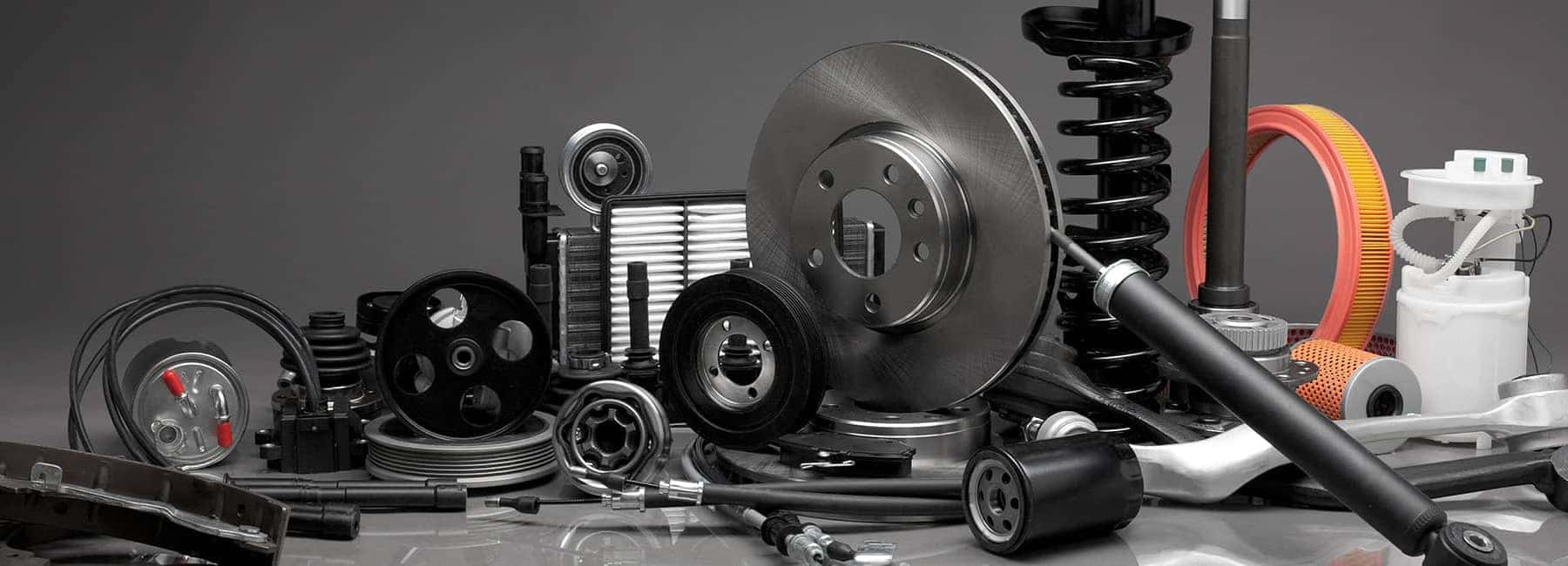 Various Car Parts Arranged on Table