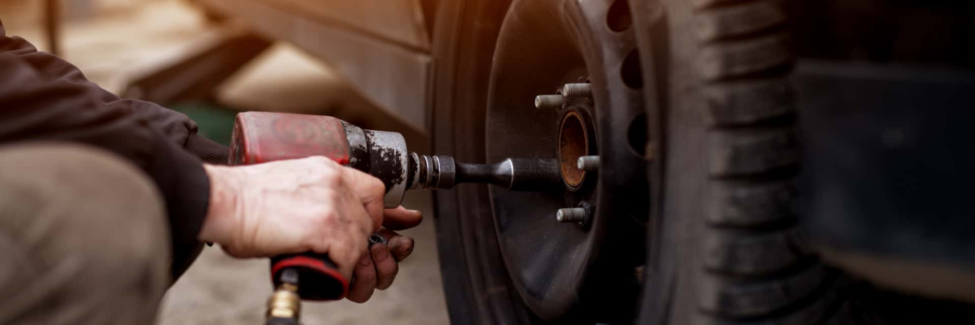 Service technician working on a tire