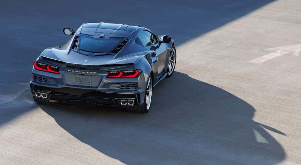 A grey 2026 Chevy Corvette E-Ray from behind.