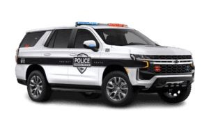 White Chevy Tahoe police vehicle angled right
