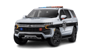 White Chevy Tahoe police vehicle angled left