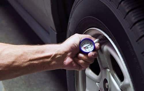 technician checking air pressure