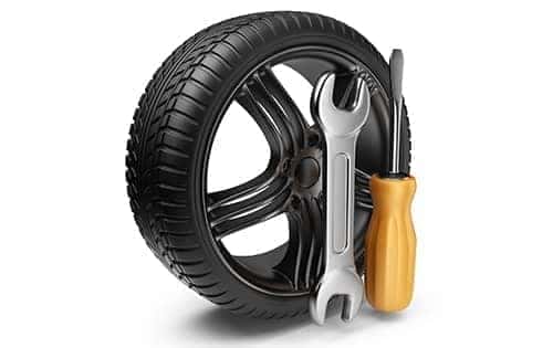 tire with wrench and screwdriver