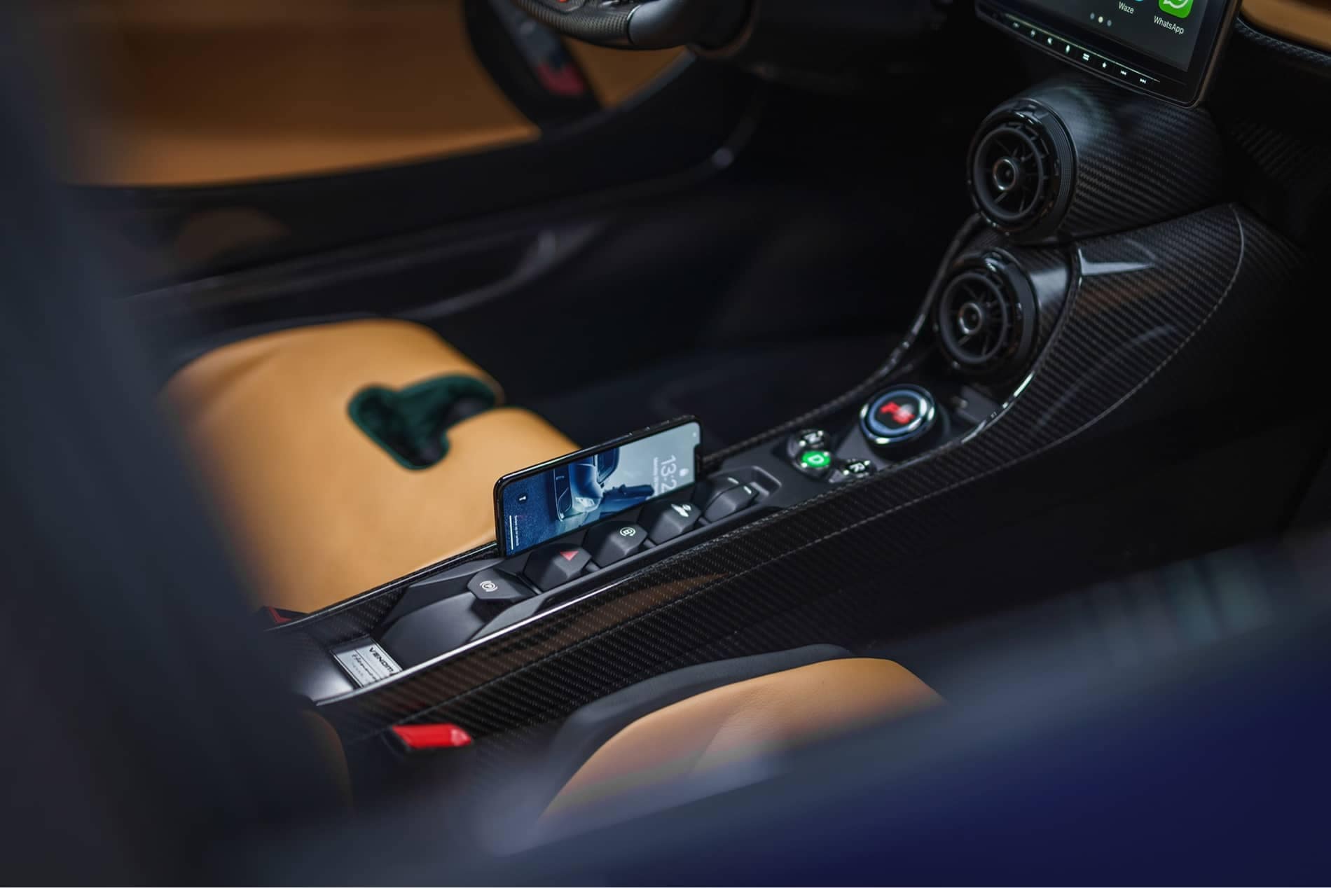 Venom F5 interior middle console with mobile phone in a pocket