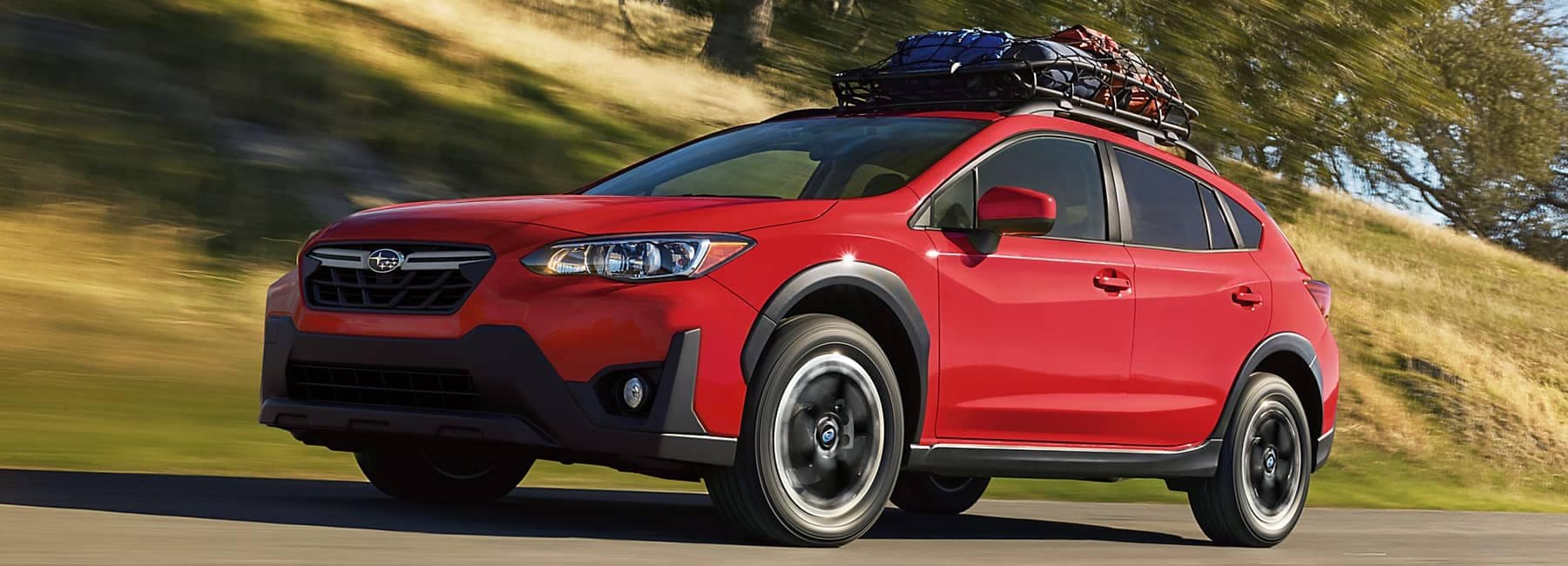 Crosstrek shown in Pure Red with accessory equipment