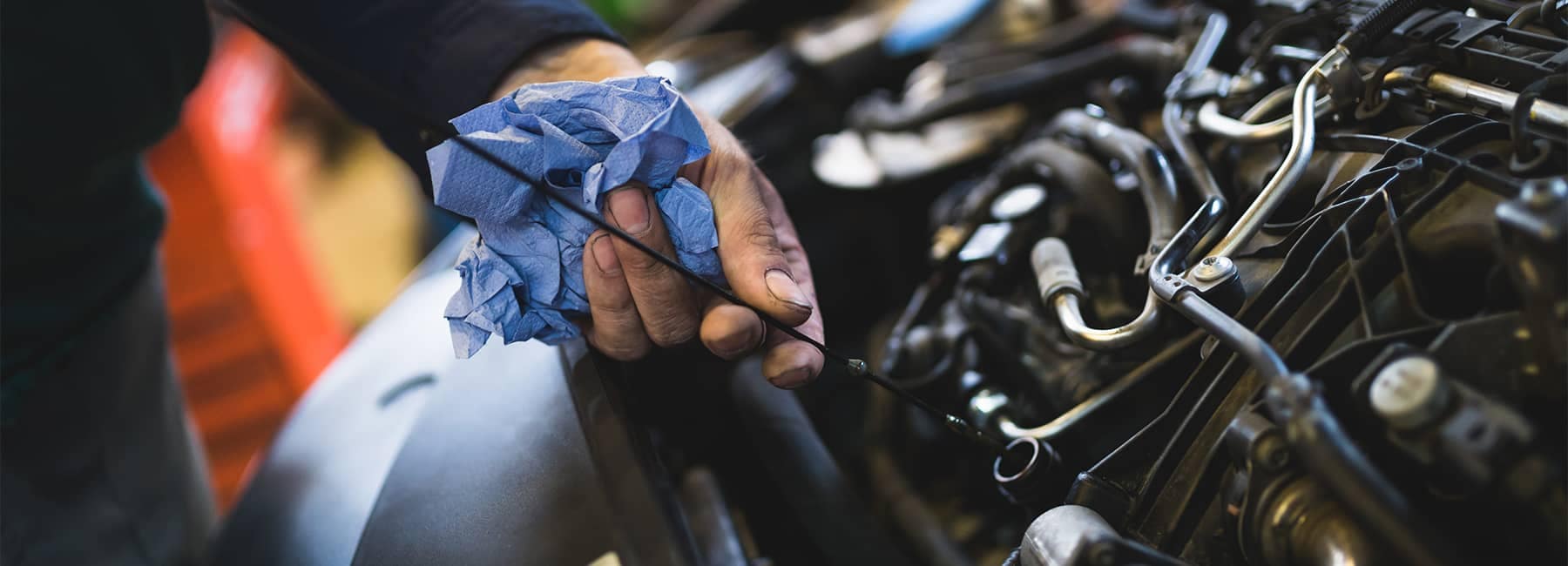 Car service mechanic working on automobile engine repair in fort worth, tx