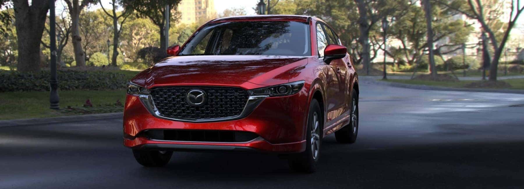 Front View of a Red CX-5 Driving