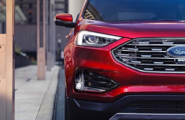 2019 Ford Edge red headlight and grille closeup