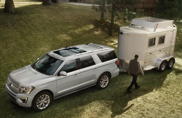 2019 Ford Expedition white towing a trailer