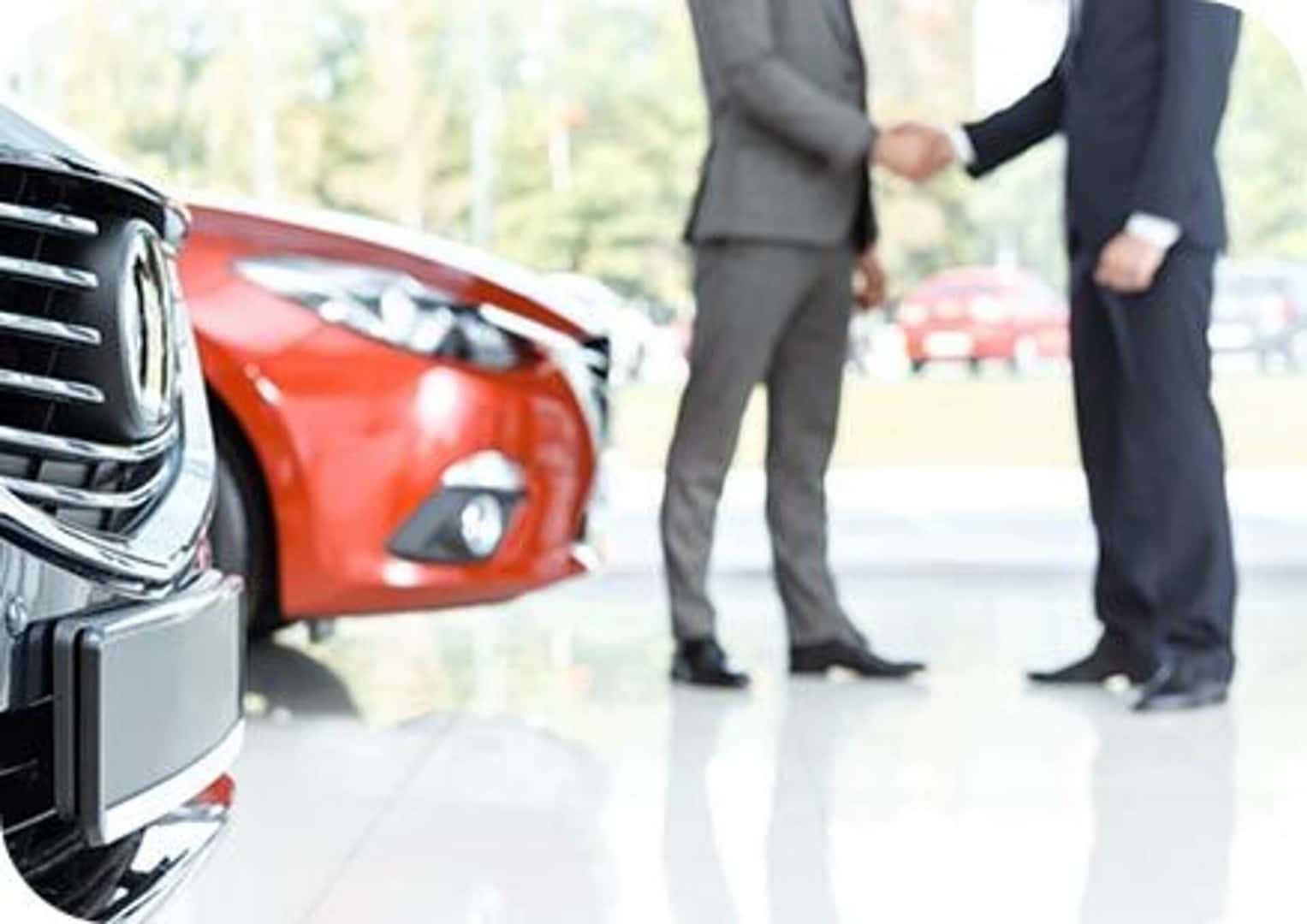 Shaking hands in showroom
