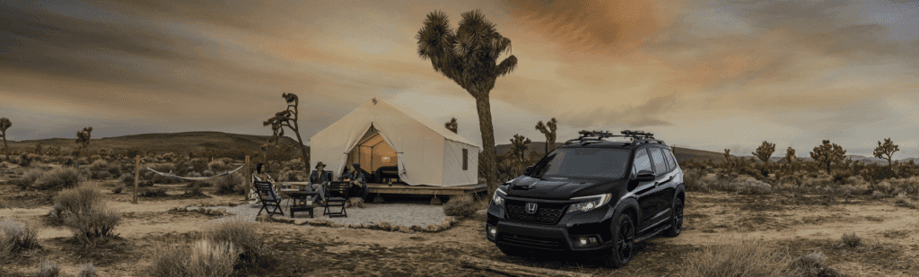2021 Honda Passport Sport Parked in Desert - Banner