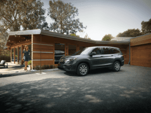 2021 Honda Pilot LX Parked Outside House