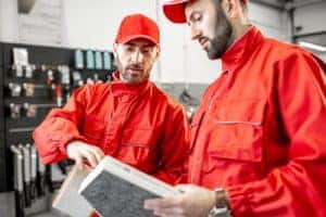 Mechanic Looking at Air Filter