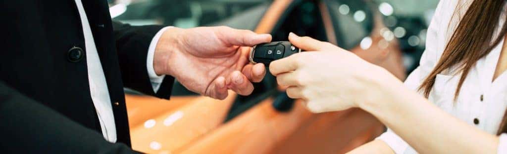 Handing Car Keys to Customer