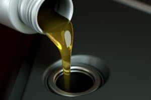 Pouring Oil into Reservoir