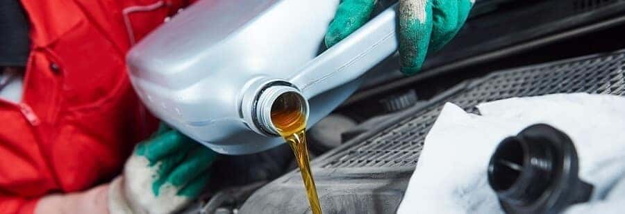 Pouring Oil into Engine