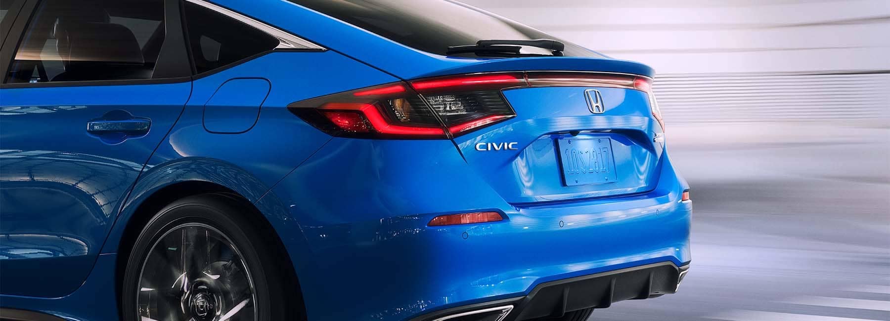 Closeup of a blue 2022 Honda Civic trunk