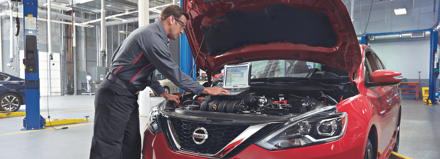 Nissan-technician-checks-engine