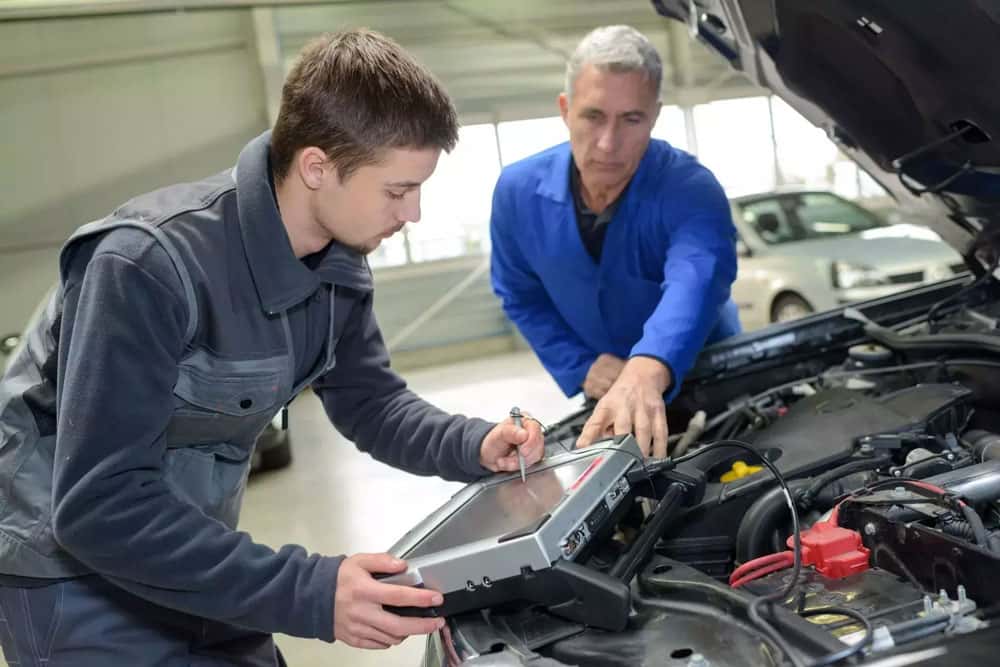 Tech Working On Car