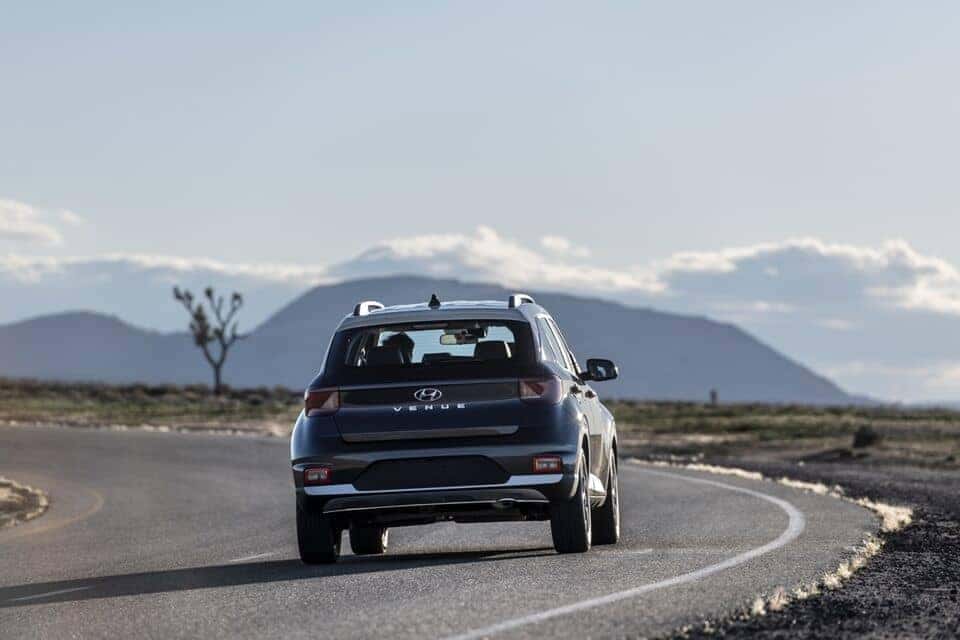 2021 Venue rear view driving on open road
