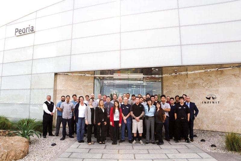Group photo outside dealership