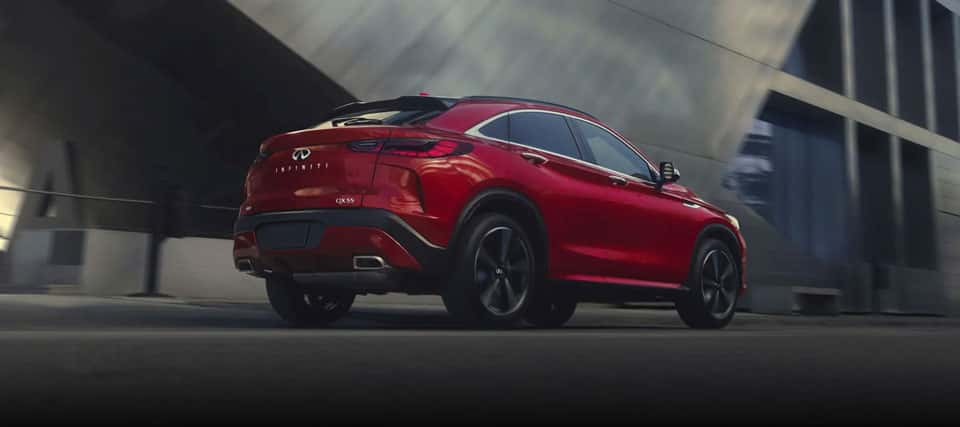 QX55 Driving In Front Of Building