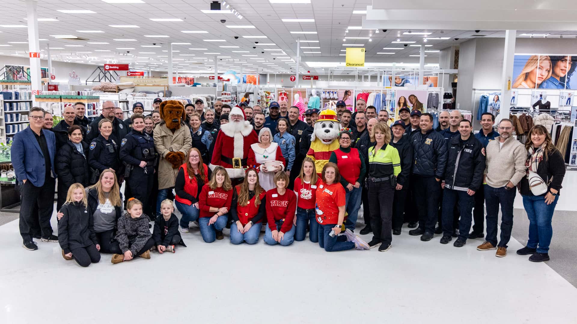 Group photo of volunteers at Lakeville MN Shop with a Hero Event