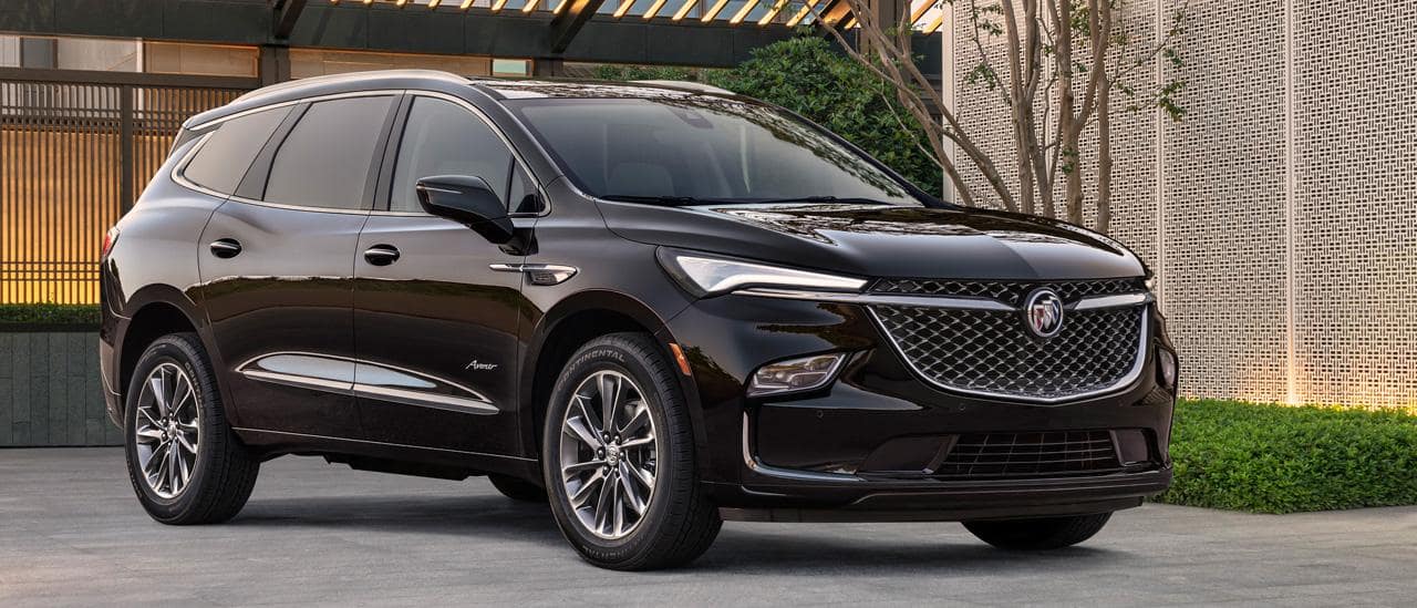 2022 Black Buick Enclave Silver Angled in driveway